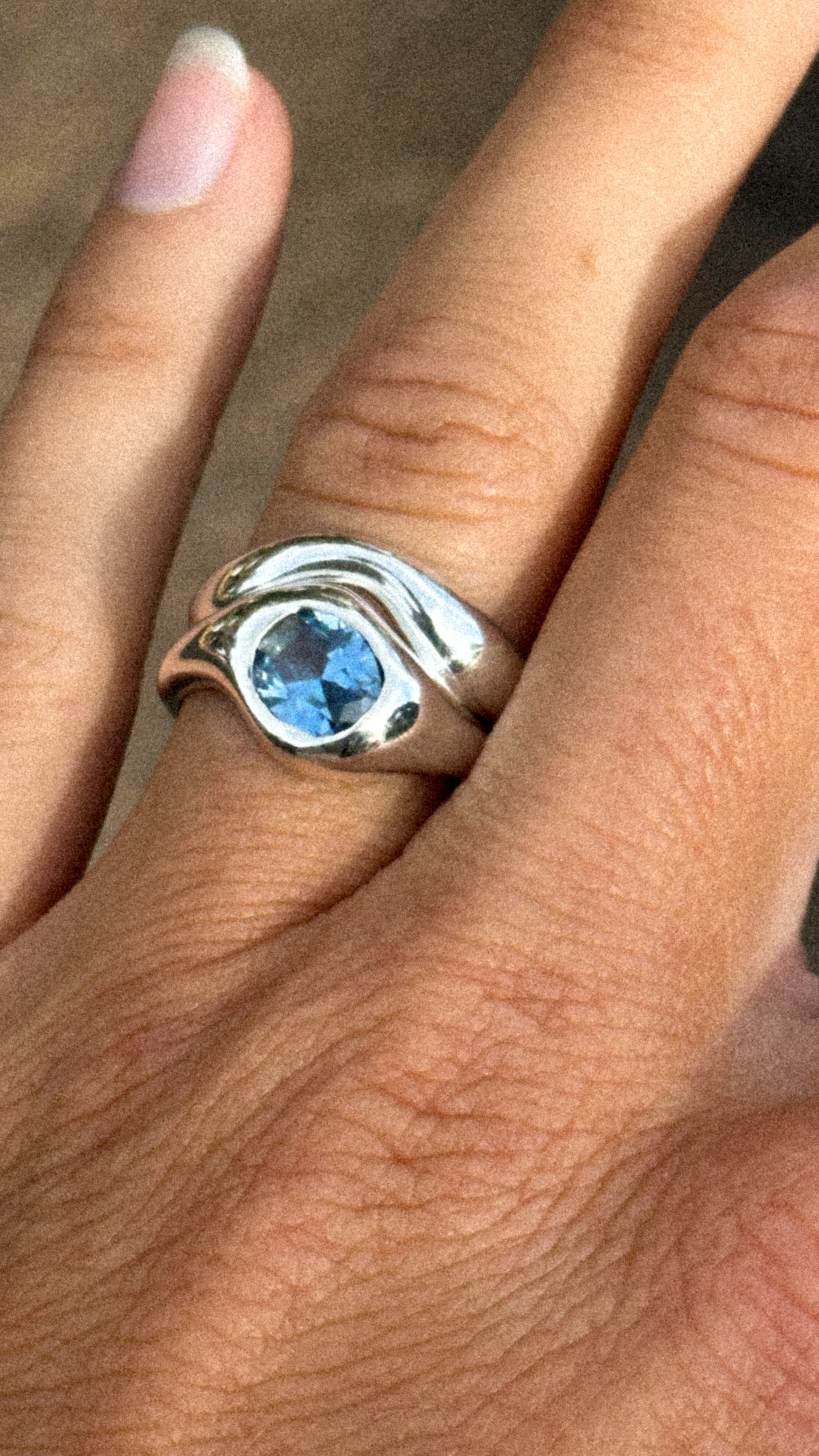 Hand-sculpted silver or gold ring with organic texture by Marea Jewelry