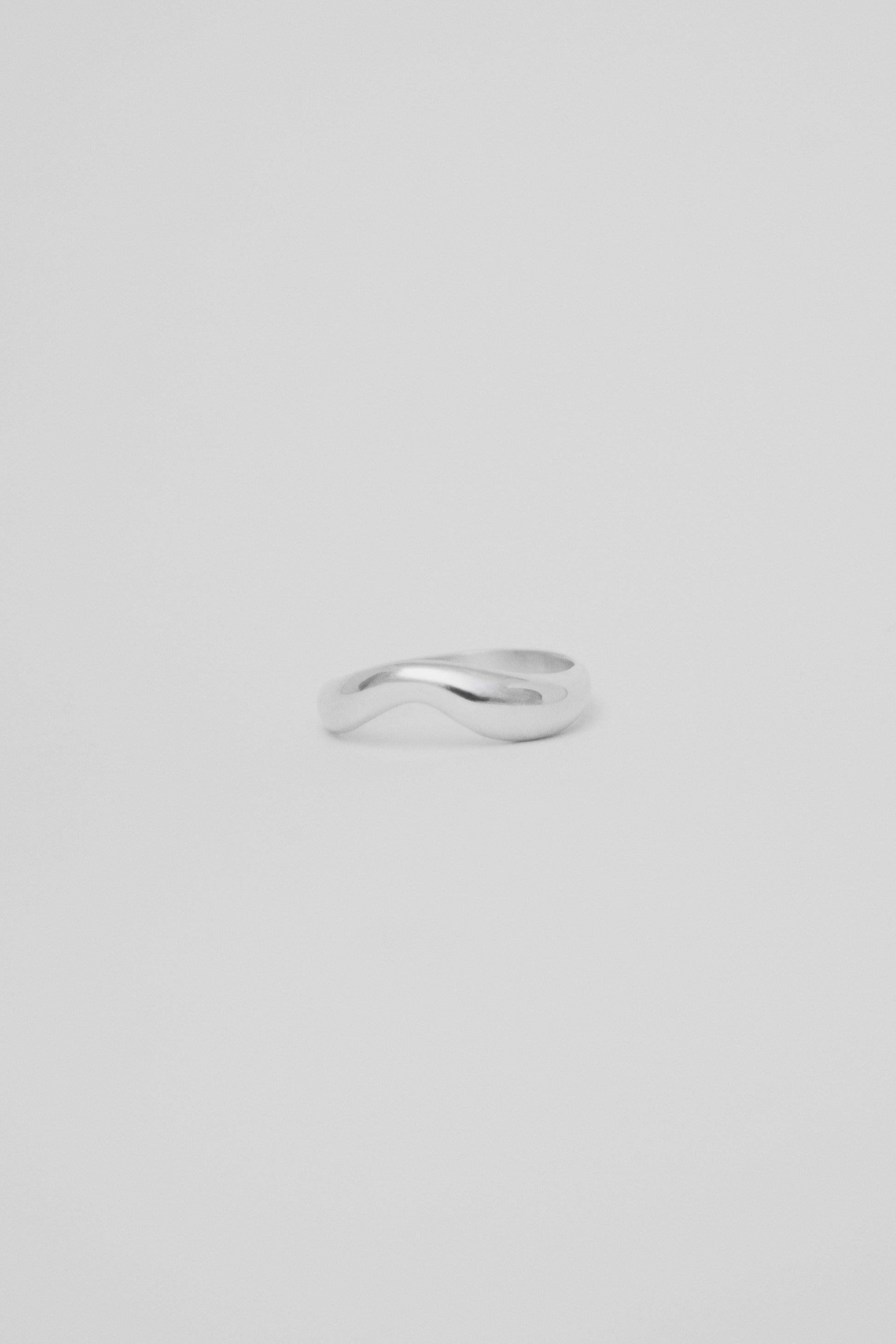 Hand-sculpted silver or gold ring with organic texture by Marea Jewelry