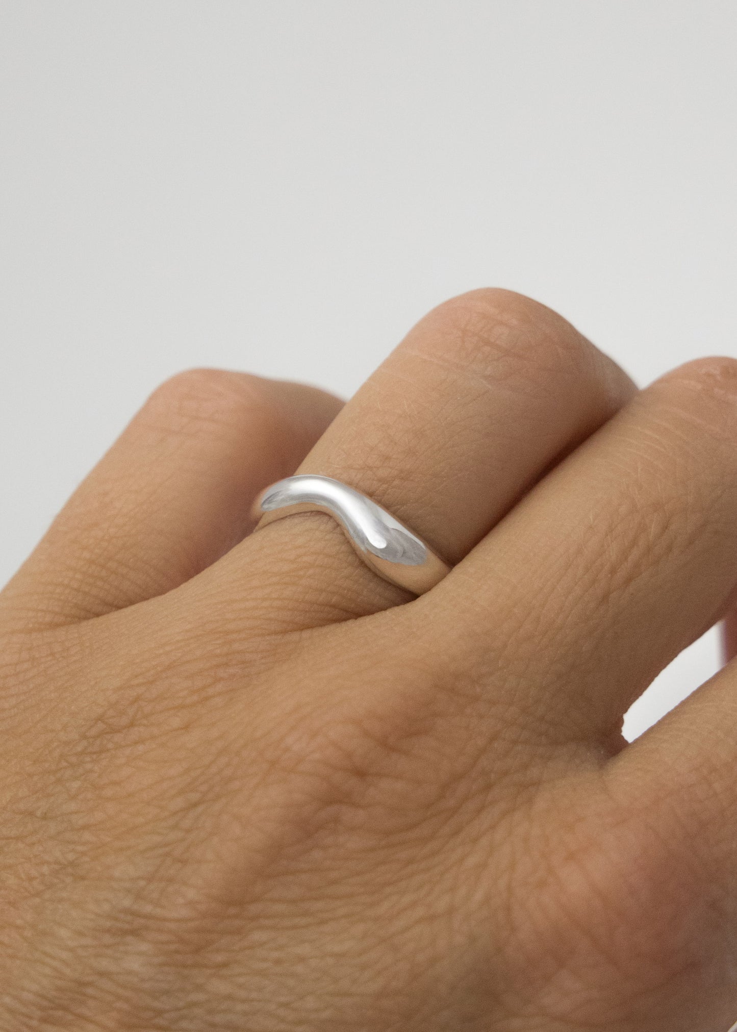 Hand-sculpted silver or gold ring with organic texture by Marea Jewelry